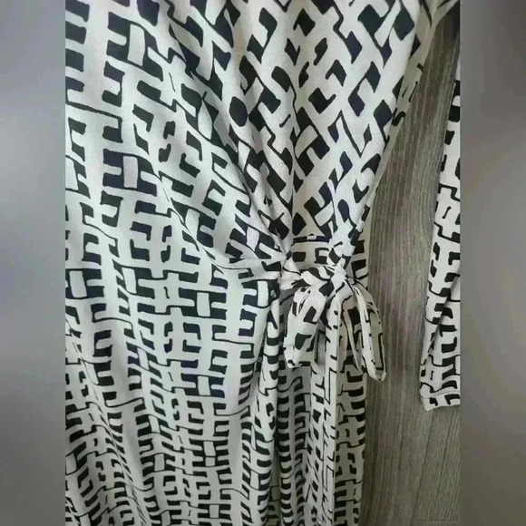 Ann Klein black and white design dress with orange strip stripe on bottom. - Picture 3 of 6